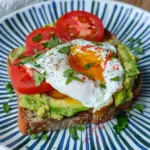 Breakfast Smashed Avocado Tomato Toast with Fried Poached Egg